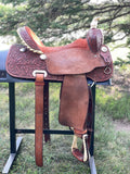 Used 16 inch Billy Cook Half Breed Barrel Saddle model 2010 with matching breastcollar and rear cinch
