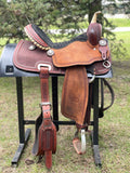 15 inch hot oil, original Billy Cook with 6 inch rear cinch, matching breastcollar, and 2 inch original Walls stirrups