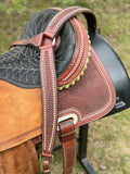 15 inch hot oil, original Billy Cook with 6 inch rear cinch, matching breastcollar, and 2 inch original Walls stirrups