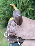 New 14 inch hard seat Pro Rider barrel saddle with copper pinwheel conchos and 4.5 inch pencil roll cantle with copper dots