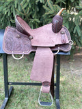 New 14 inch hard seat Pro Rider barrel saddle with copper pinwheel conchos and 4.5 inch pencil roll cantle with copper dots