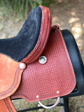 New 16 inch Pro Rider saddle with 7 inch gullet, waffle tooling, worm border, black suede seat