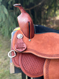 New 16 inch Pro Rider saddle with 7 inch gullet, waffle tooling, worm border, black suede seat