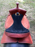 New 16 inch Pro Rider saddle with 7 inch gullet, waffle tooling, worm border, black suede seat