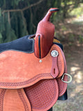New 16 inch Pro Rider saddle with 7 inch gullet, waffle tooling, worm border, black suede seat