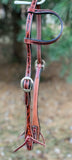 Professionals Choice chestnut colored single ear headstall with stitched borders and black vine tooling 3P1027-C