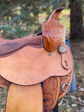 16 inch used Guffey Saddle, rust suede seat, swept back pommel